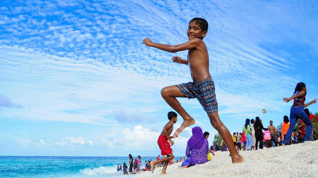 Boy near shore in Maldives